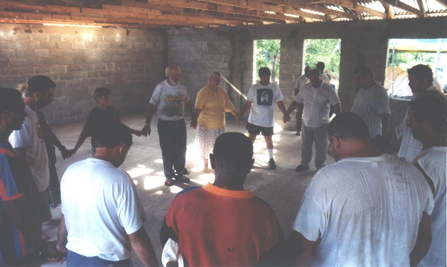 The new church is nearly built. We're gathered in prayer blessing the new building, giving thanks and standing in awe of God. 